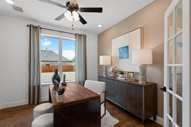 office featuring french doors, ceiling fan, and dark hardwood / wood-style flooring