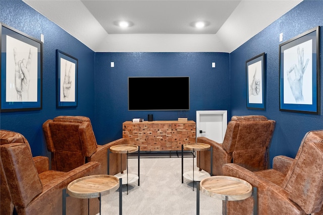 interior space featuring vaulted ceiling and carpet floors