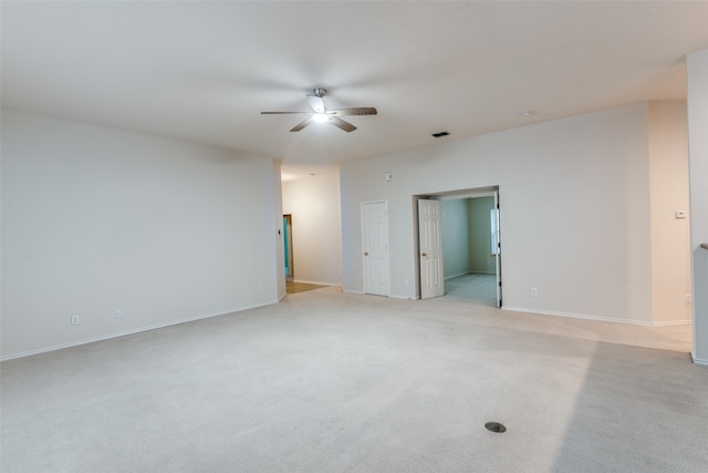 carpeted empty room with ceiling fan