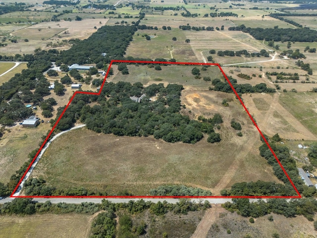 birds eye view of property featuring a rural view