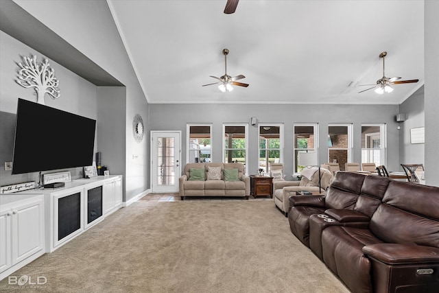 living room with ceiling fan, crown molding, french doors, and light carpet