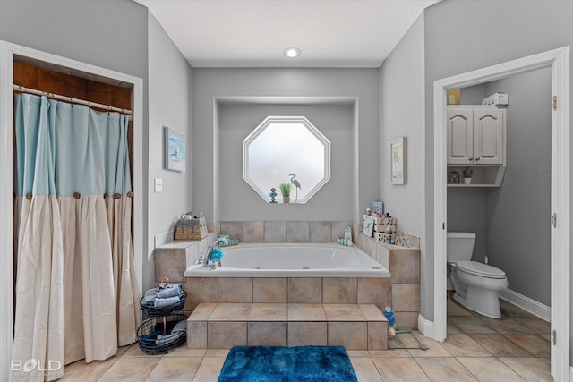 bathroom featuring separate shower and tub, toilet, and tile patterned floors