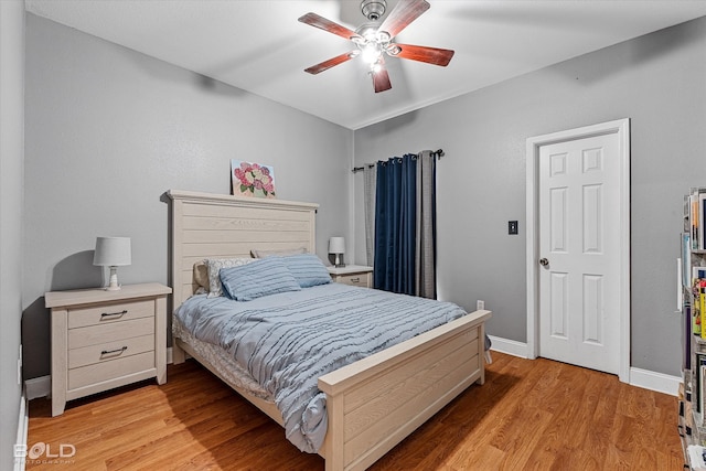 bedroom featuring ceiling fan and light hardwood / wood-style flooring