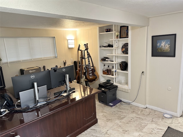 office area featuring a textured ceiling