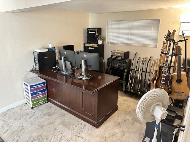 office with a textured ceiling