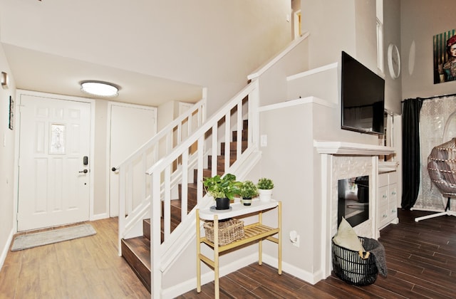 entryway with wood-type flooring