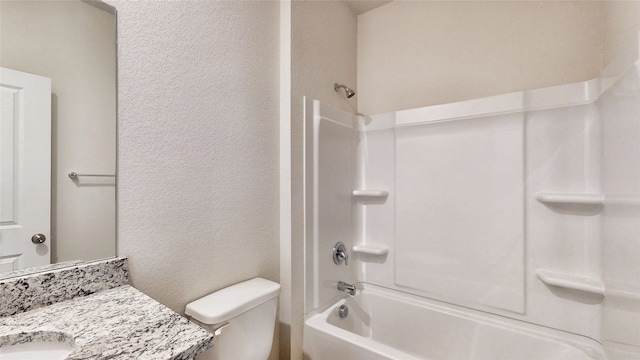 full bathroom with shower / bathing tub combination, vanity, and toilet