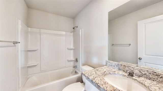 full bathroom with  shower combination, vanity, and toilet