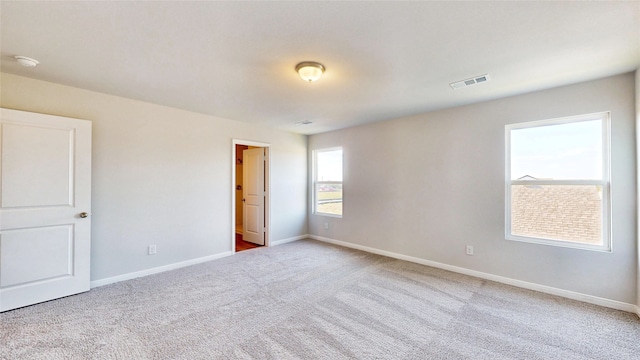 unfurnished room with carpet