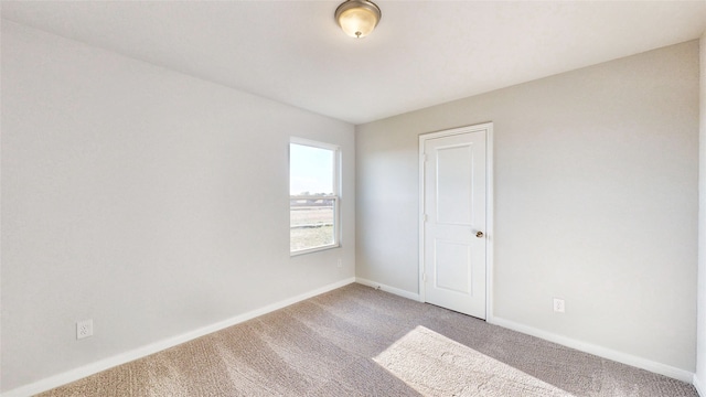 unfurnished room with carpet