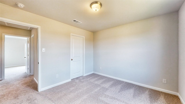 unfurnished bedroom with light colored carpet