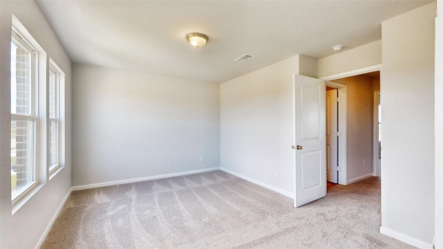 view of carpeted spare room