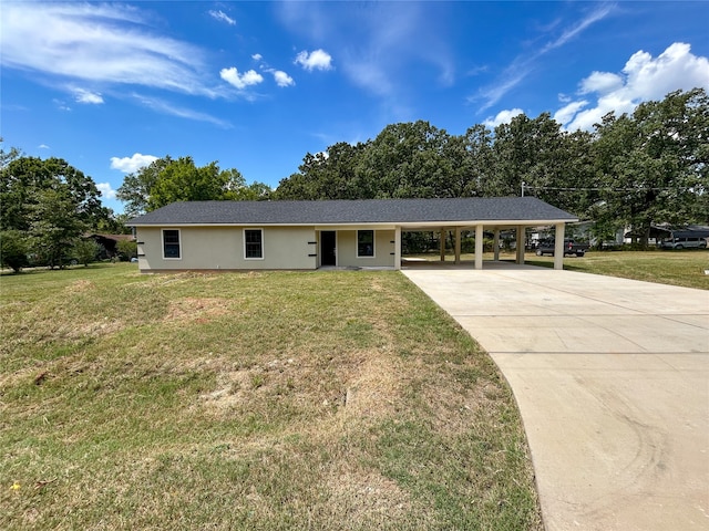 ranch-style house with a front yard and a carport