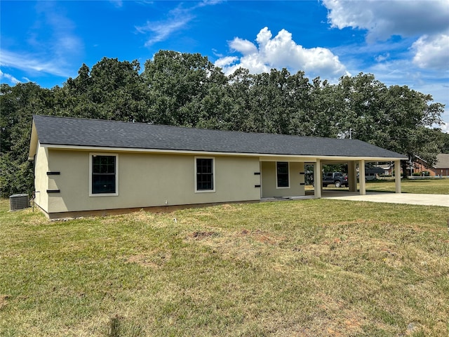 single story home with a front lawn, a patio area, and cooling unit