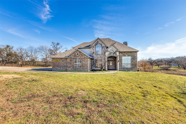 front of property featuring a front yard