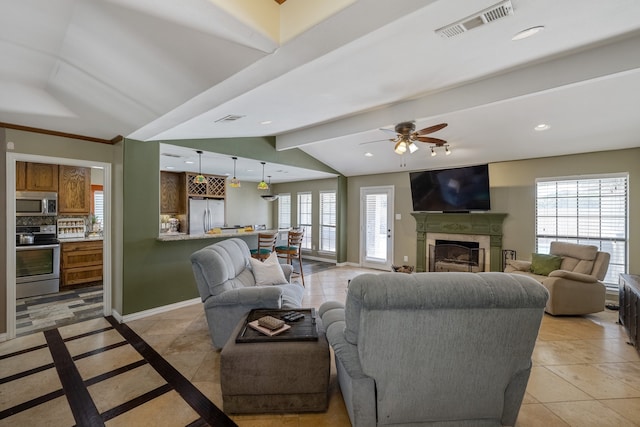 tiled living room with ceiling fan and lofted ceiling with beams