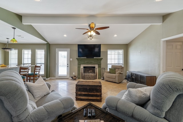 living room with ceiling fan, vaulted ceiling with beams, and light tile patterned floors