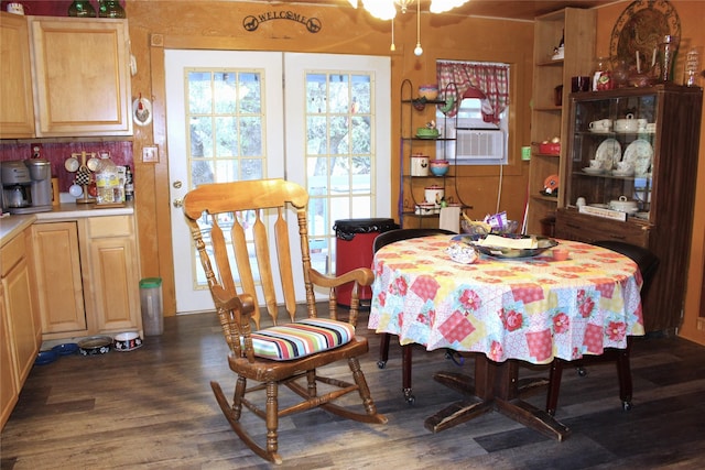 dining area with dark wood-type flooring