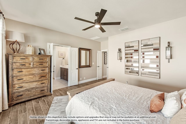 bedroom featuring ceiling fan, wood-type flooring, and ensuite bath