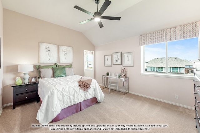 carpeted bedroom with ceiling fan and lofted ceiling