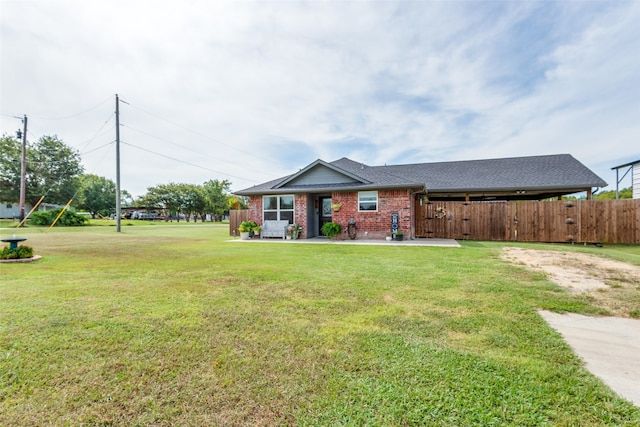 ranch-style house with a front lawn