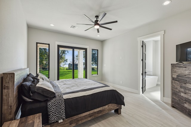 bedroom featuring ceiling fan, access to outside, and ensuite bathroom