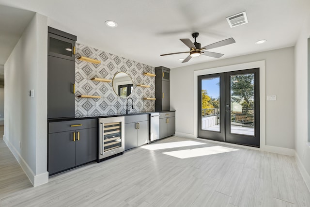 bar featuring dishwasher, french doors, sink, wine cooler, and ceiling fan