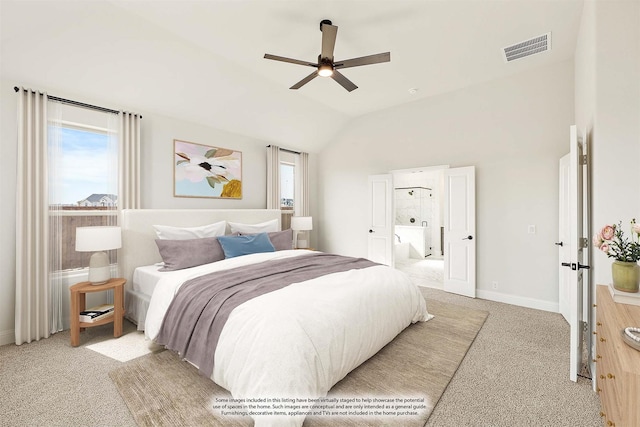 bedroom with ceiling fan, vaulted ceiling, and light colored carpet