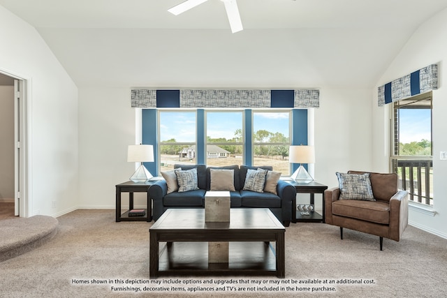 carpeted living room featuring ceiling fan and lofted ceiling