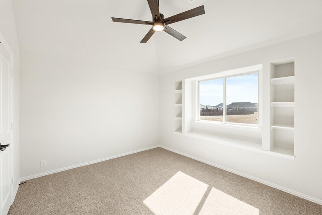 carpeted cinema with vaulted ceiling