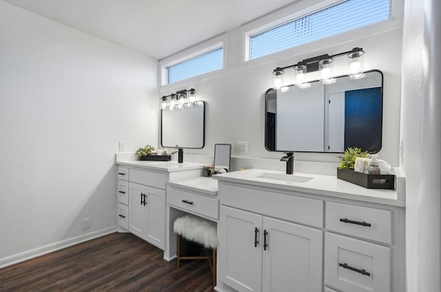 bathroom featuring hardwood / wood-style floors and vanity