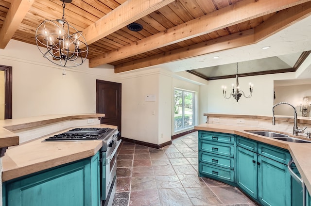 kitchen with blue cabinetry, sink, wooden ceiling, pendant lighting, and appliances with stainless steel finishes