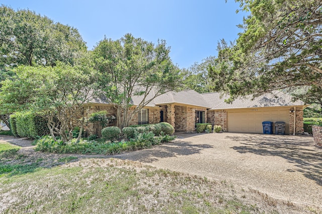 single story home with a garage