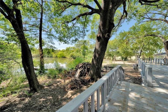 deck featuring a water view