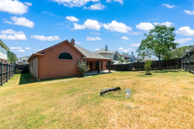 exterior space featuring a patio and a yard