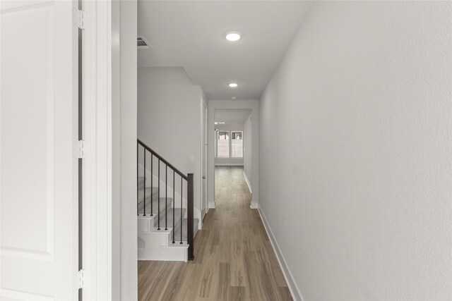 hallway featuring light hardwood / wood-style floors