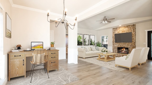 living room featuring ceiling fan with notable chandelier, vaulted ceiling with beams, hardwood / wood-style floors, ornamental molding, and a fireplace