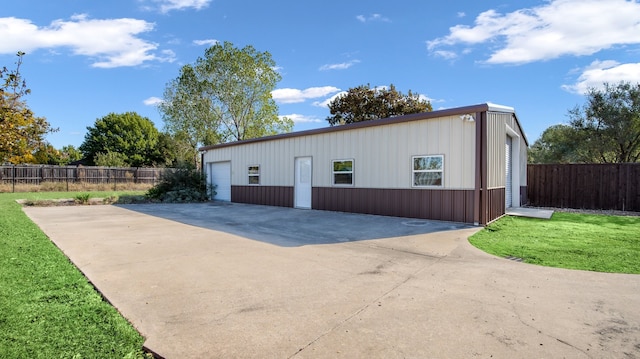 garage with a lawn