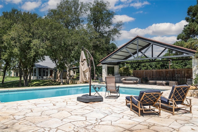 view of swimming pool featuring a gazebo, a patio area, and a jacuzzi