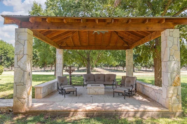 view of patio featuring a gazebo and an outdoor living space