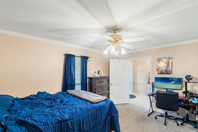 bedroom featuring ornamental molding, light colored carpet, ceiling fan, and a textured ceiling