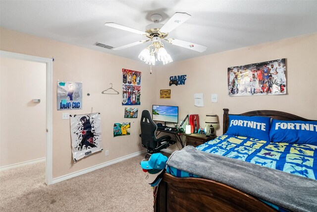 bedroom with light carpet and ceiling fan