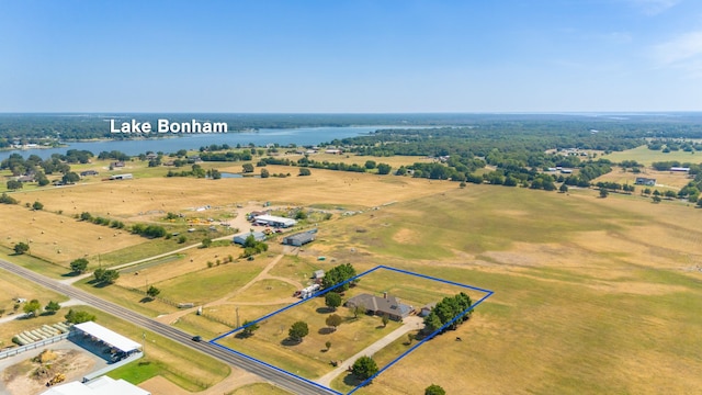 aerial view featuring a water view and a rural view