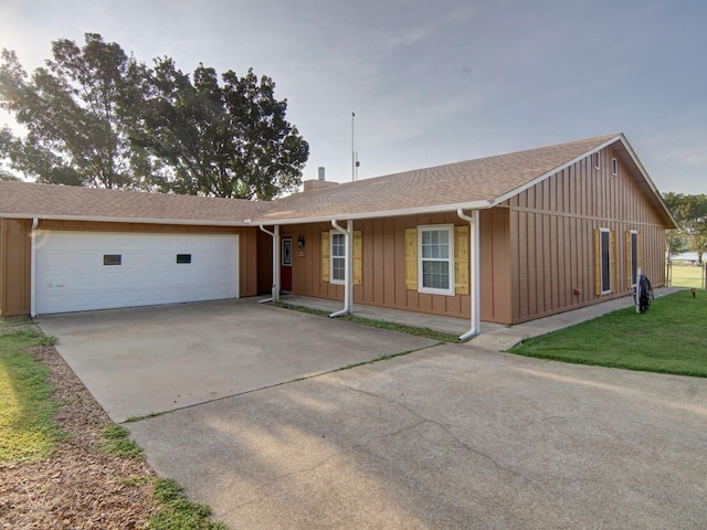 single story home with a garage