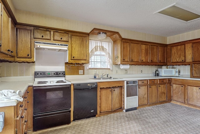 kitchen featuring white microwave, under cabinet range hood, electric range, black dishwasher, and light countertops