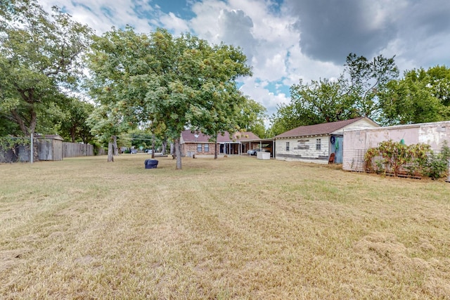 view of yard featuring fence