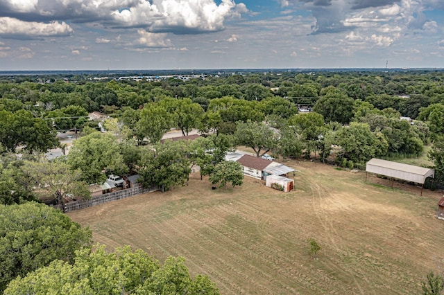 bird's eye view featuring a rural view and a wooded view