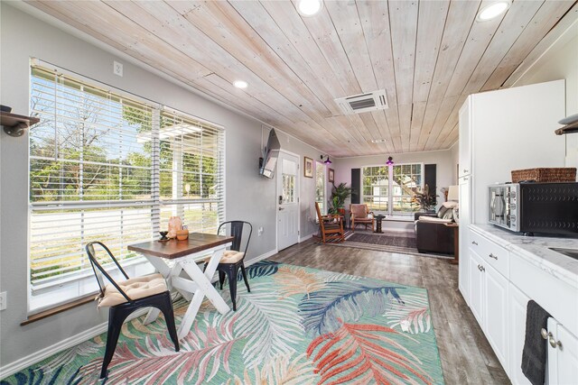 bungalow with a porch and a front lawn