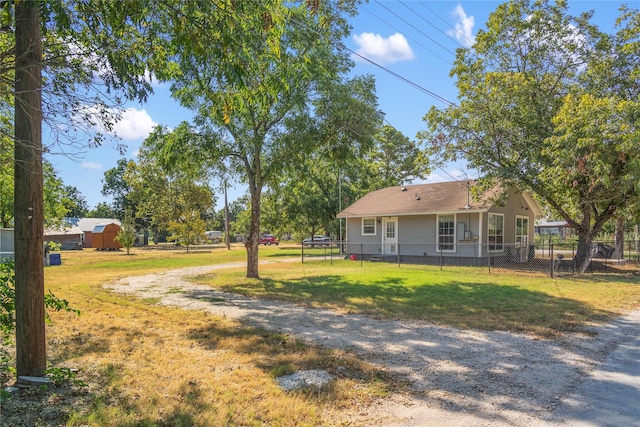 view of yard with a storage shed