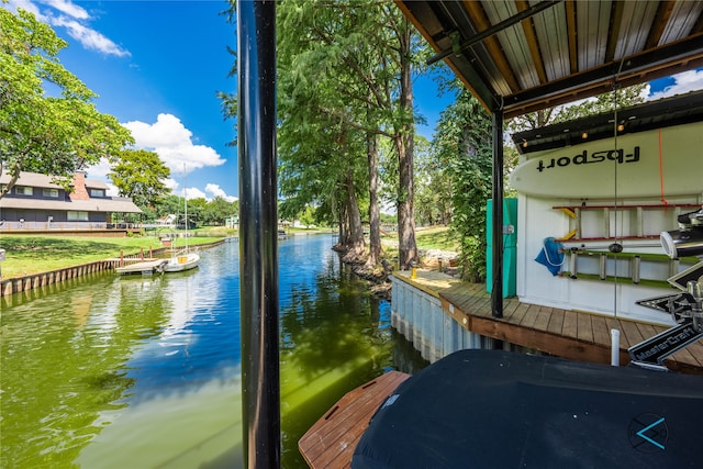 dock area featuring a water view